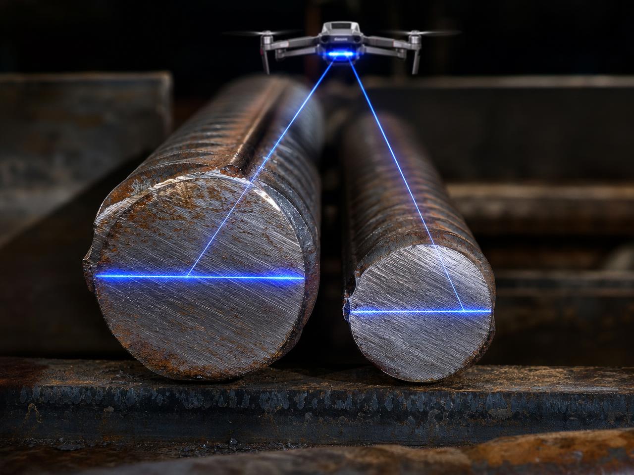 Ends of a number four and number five reinforcing bar compared with a blue laser diameter measurement